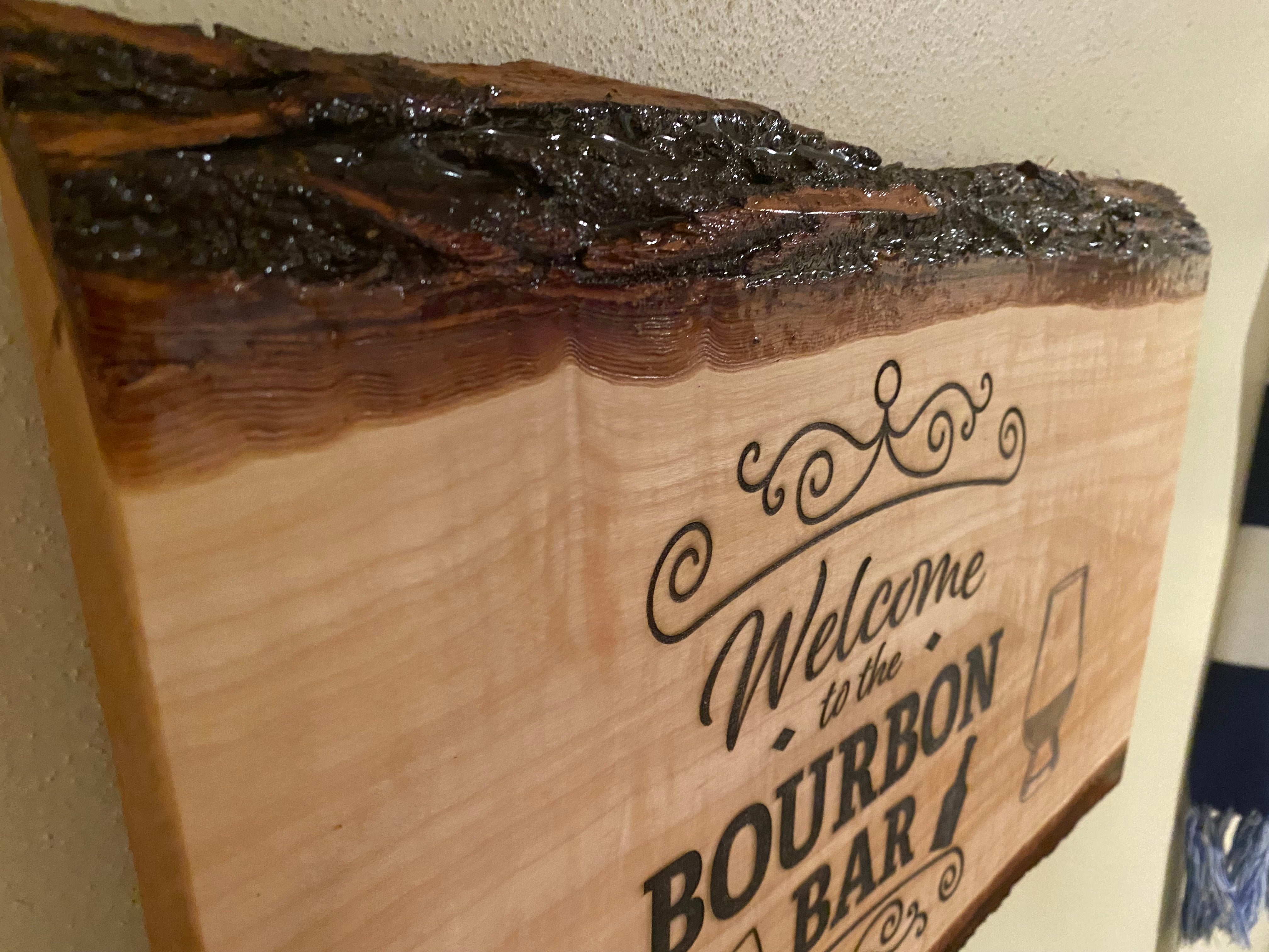 Welcome to the Bourbon Bar Sign = Side Angled Bark View