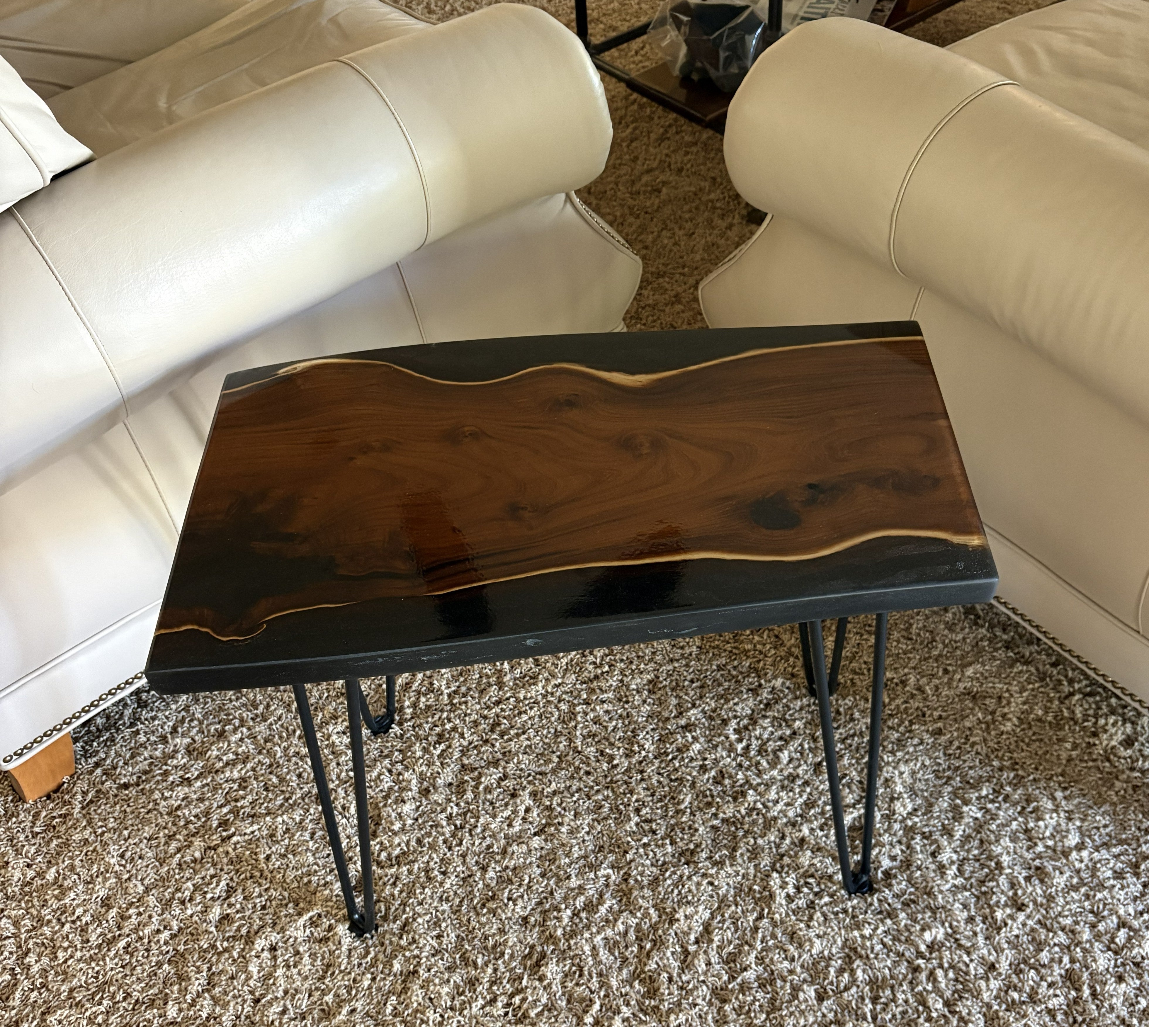 Live Edge Russian Olive Table: Elegant Black Epoxy Resin