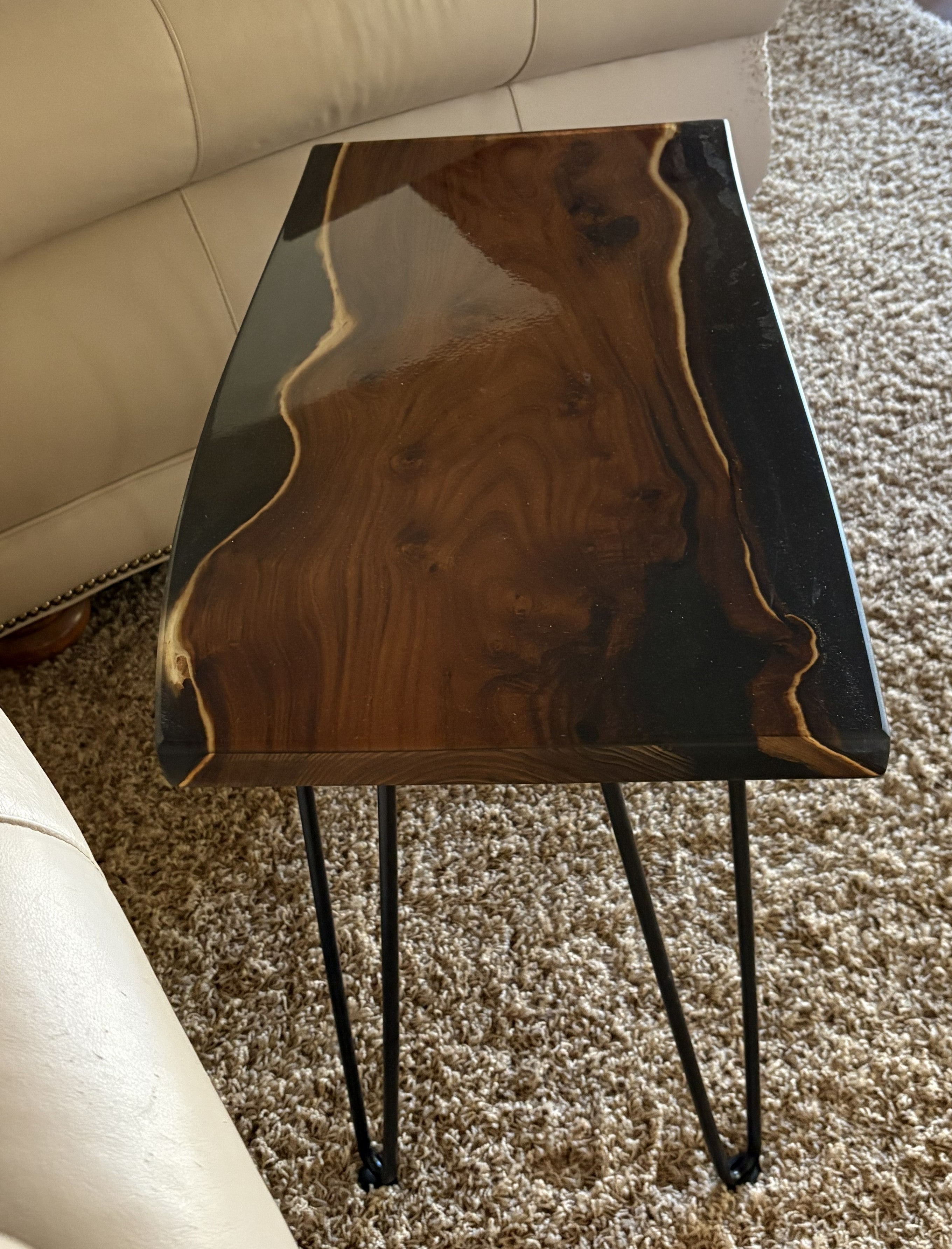 Live Edge Russian Olive Table: Elegant Black Epoxy Resin