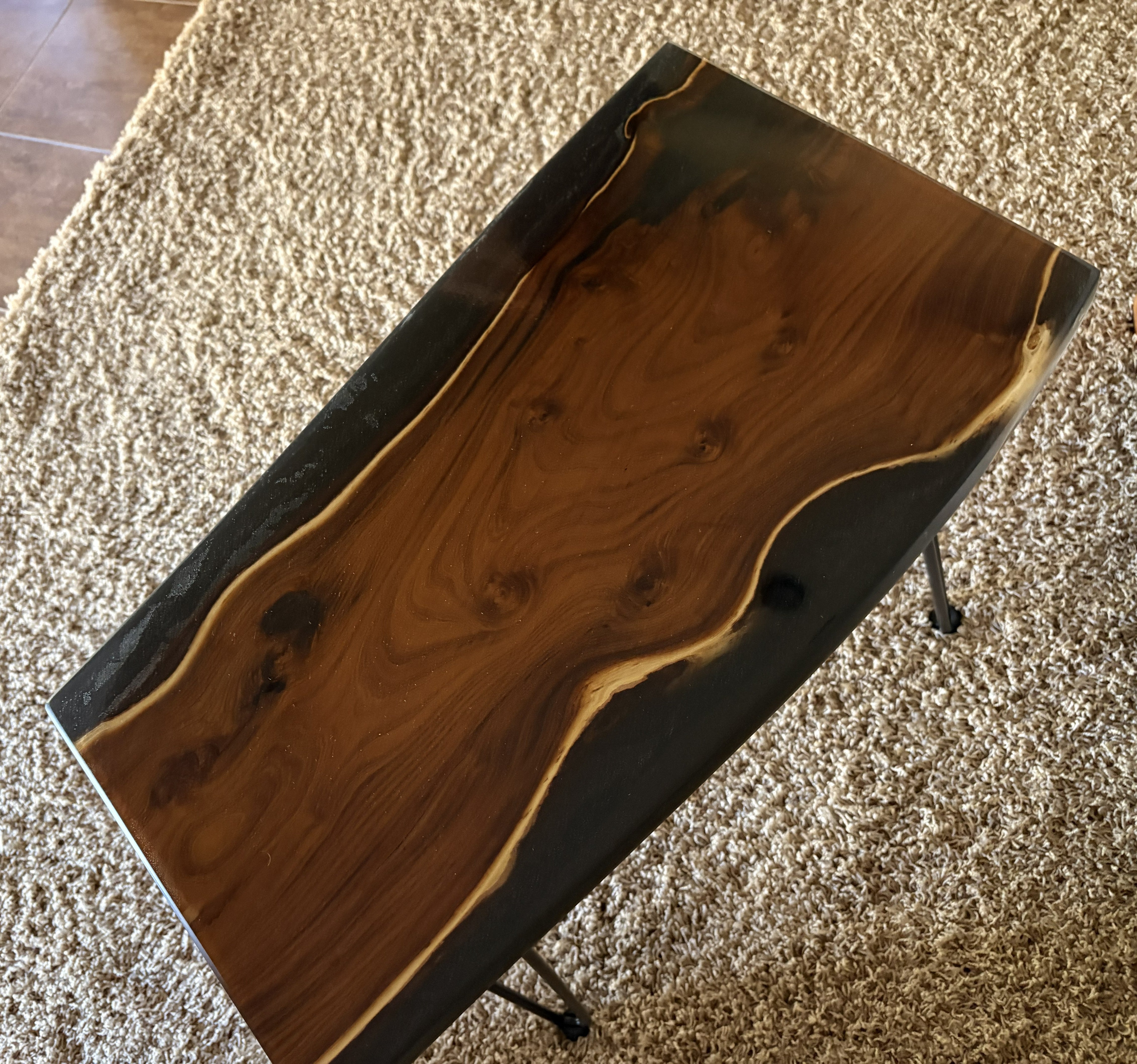 Live Edge Russian Olive Table: Elegant Black Epoxy Resin