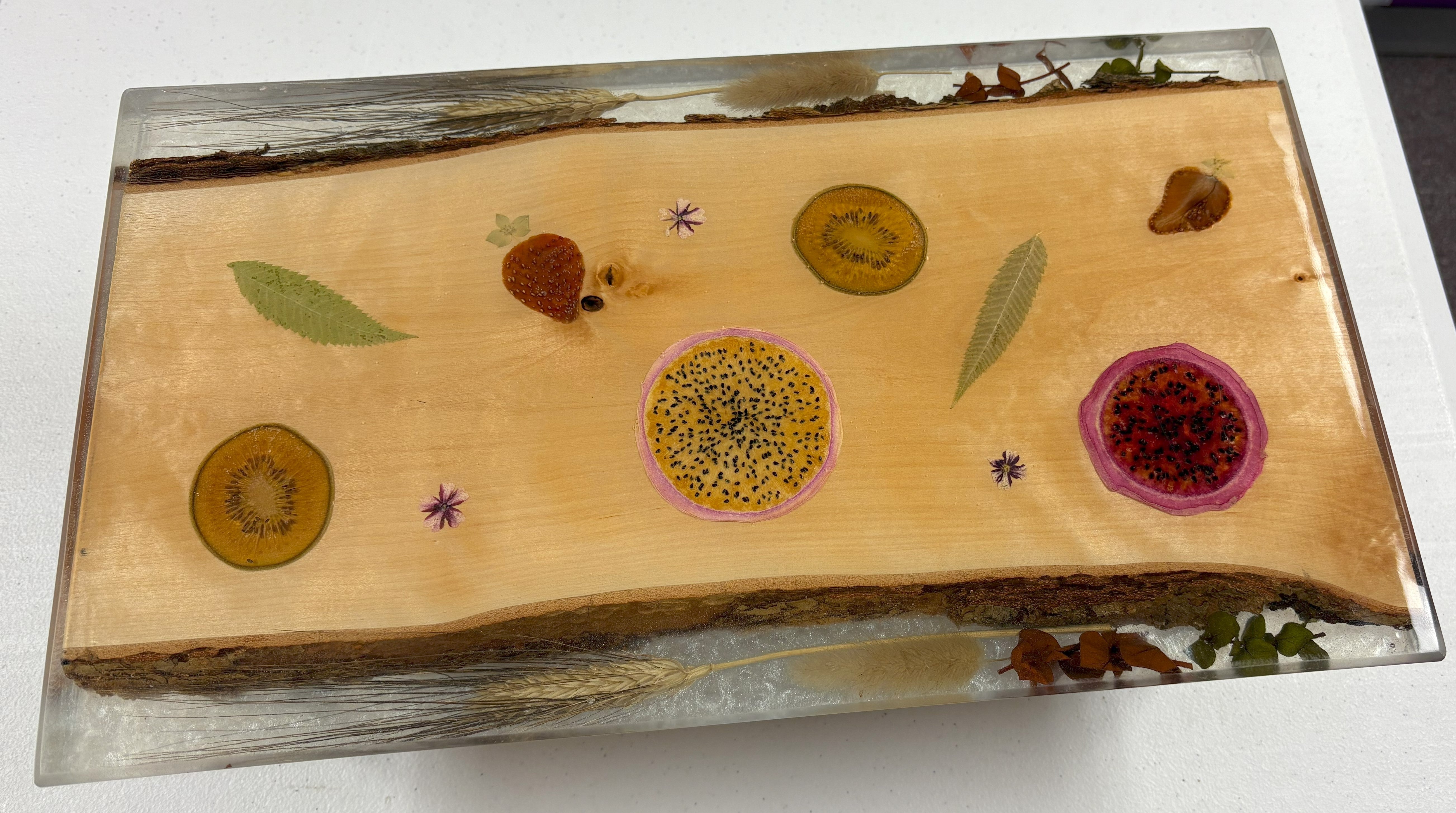 Charcuterie Board With Embedded Flowers and Fruit